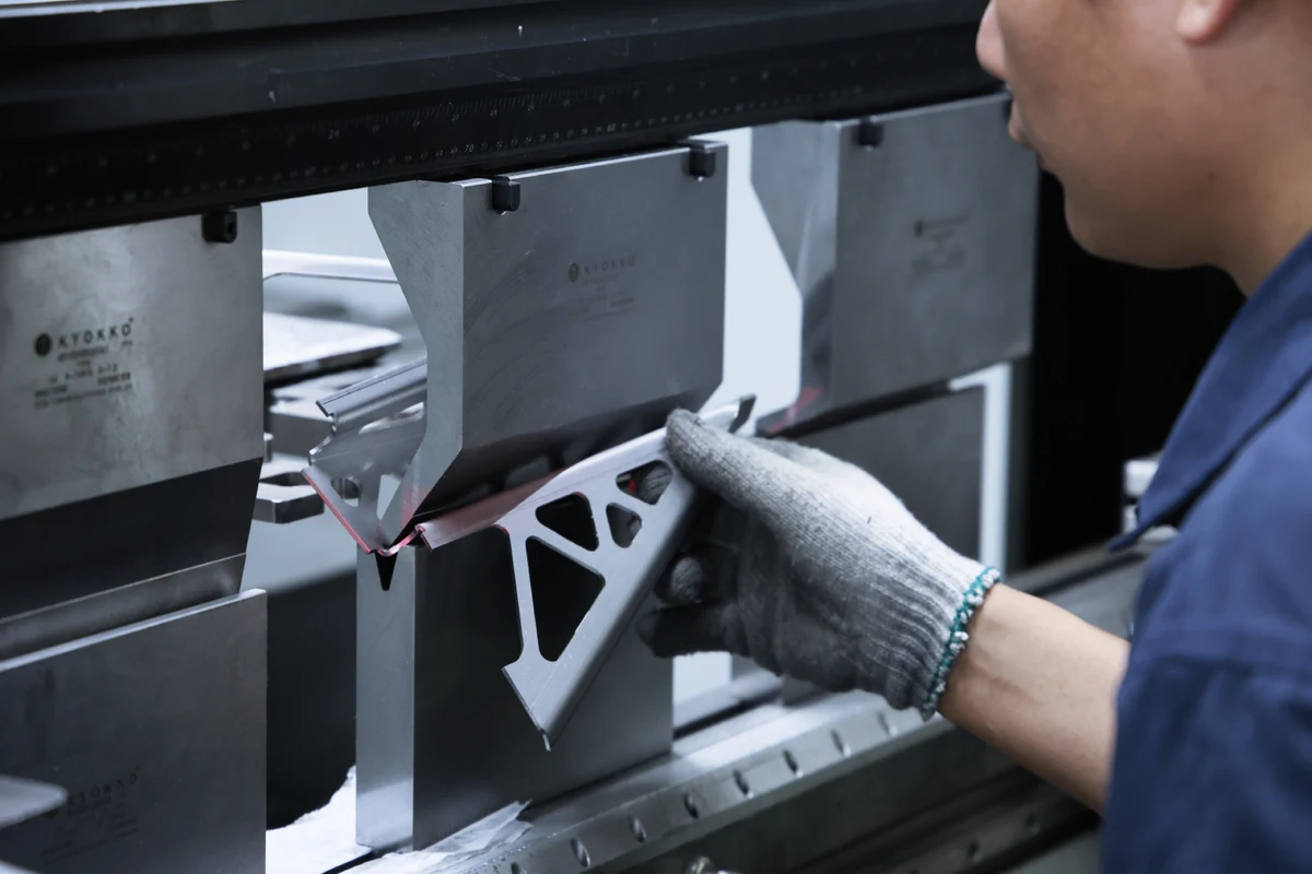 Press brake bending a sheet metal bracket